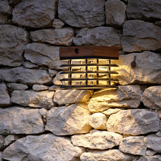 Tekura sconce solar light mounted on stone wall